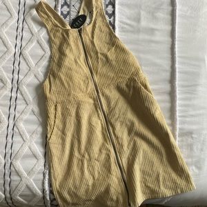 Corduroy dress. Zip up, tags on. Brand new!
